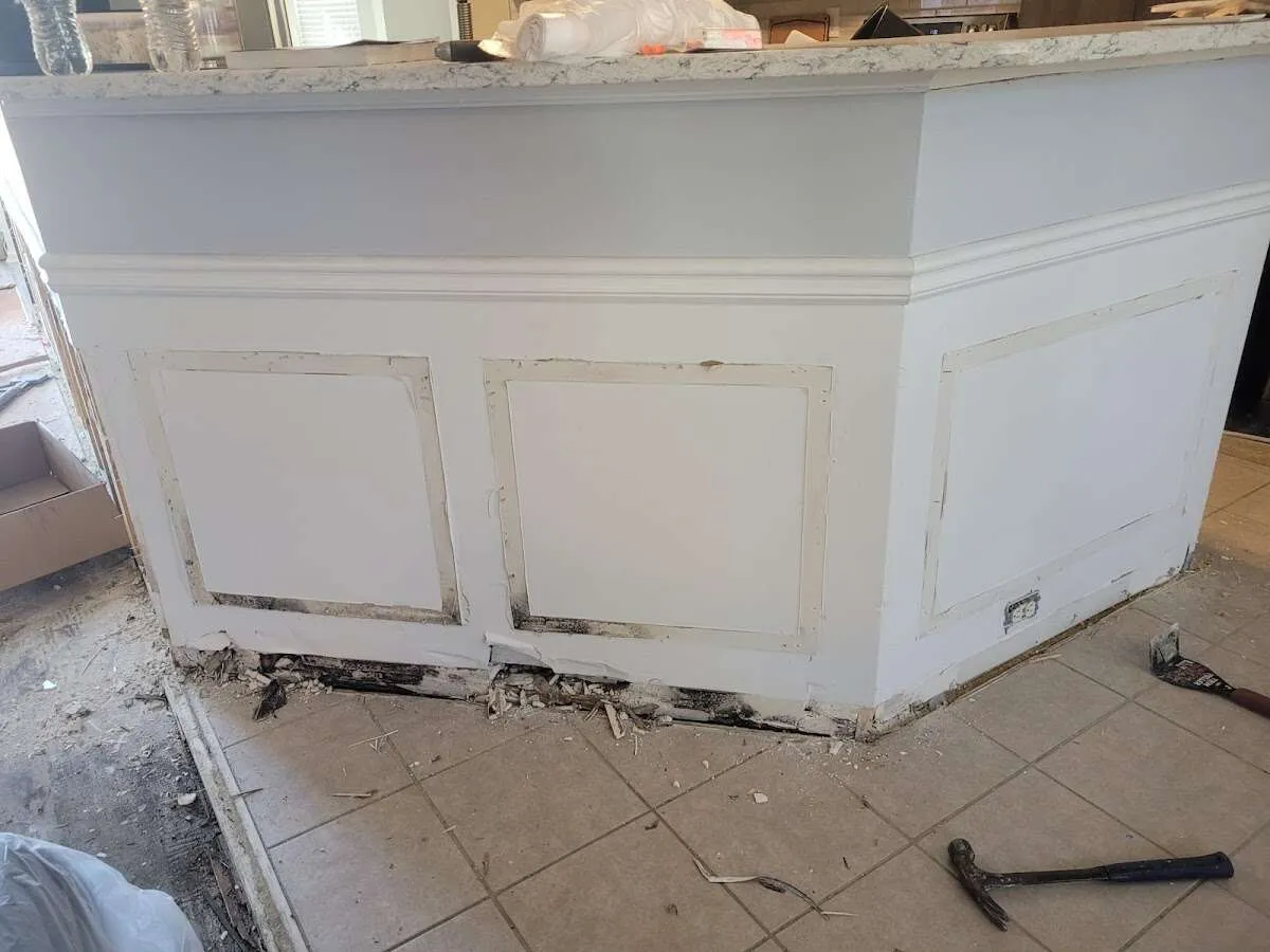 Water damage and mold on kitchen during Sewage Cleanup & Sanitation in Medway